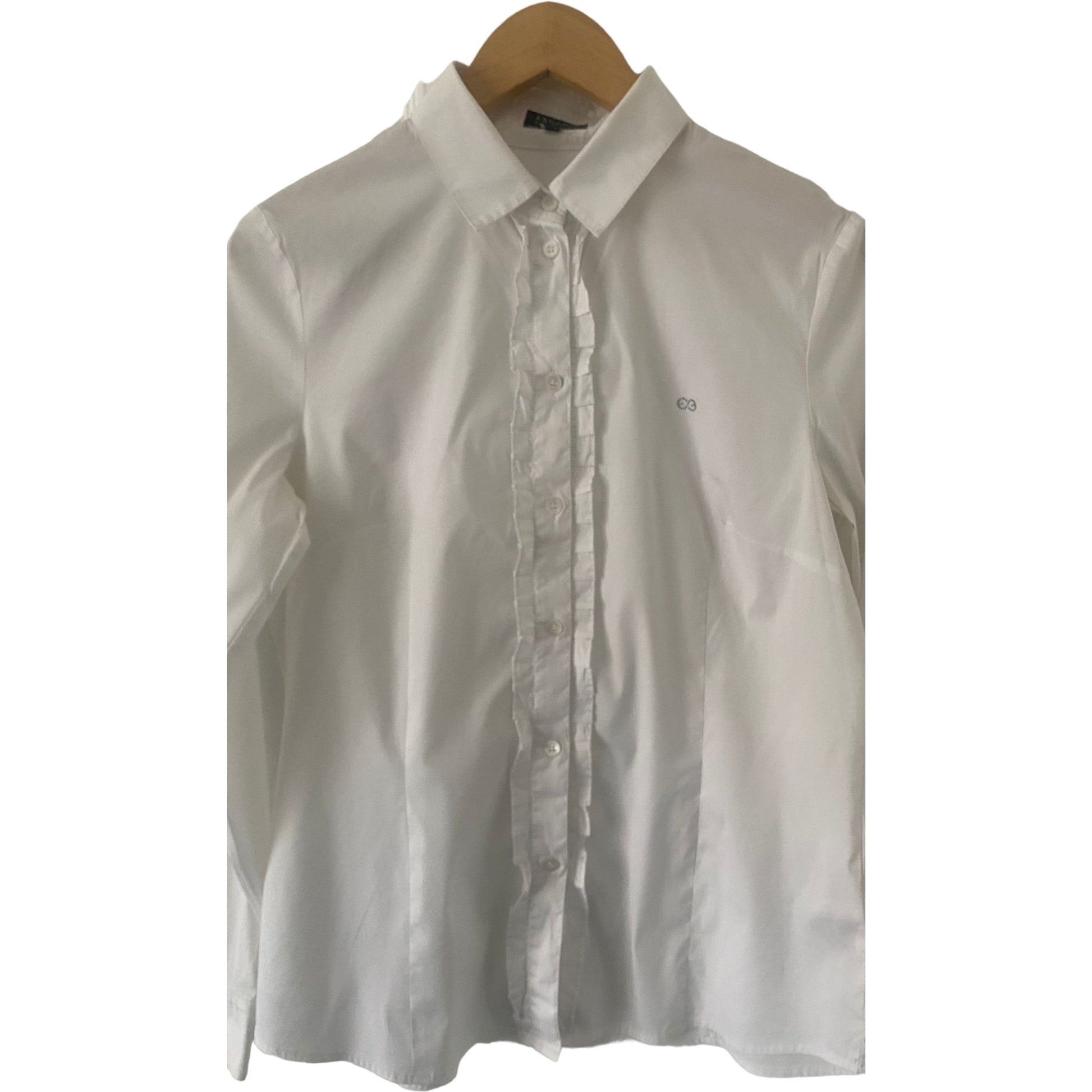 Escada Sport Size 12This Escada Sport white shirt is a perfect blend of style and functionality. This premier branded shirt,  features a classic white button shirt design with decorative frills along the button seams and cuffed sleeves. For added sparkle, it is completed with a diamante motif. Preloved