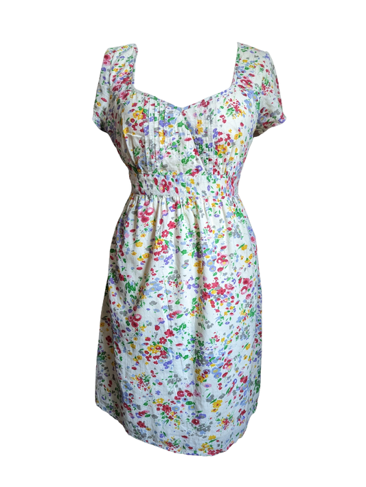 Preloved. This stunning Pretty Fat Face Dress guarantees a flattering fit with its elastic back waist and ties, delicate chest detailing, and full lining. This lovely floral dress is perfect for any summer occasion, featuring size 12 for a comfortable fit. Enjoy feeling good and looking beautiful in this stylish summer dress.