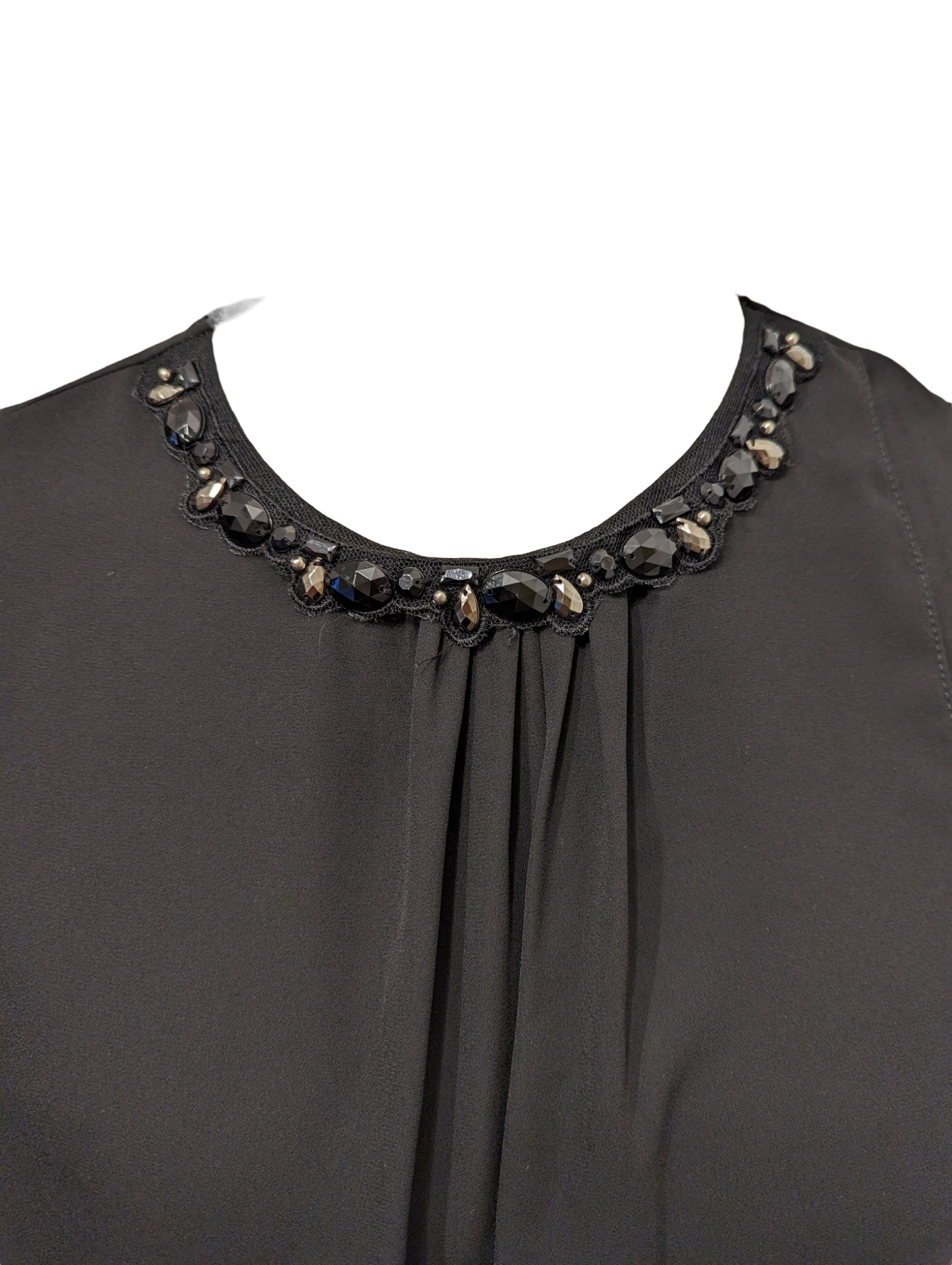 Look classy and feel comfortable with the M & Co Top Black. The illusion wrap around design and diamante necklace add glamour, while the size 14 cut ensures a perfect fit. Perfect for a night out or casual afternoon.