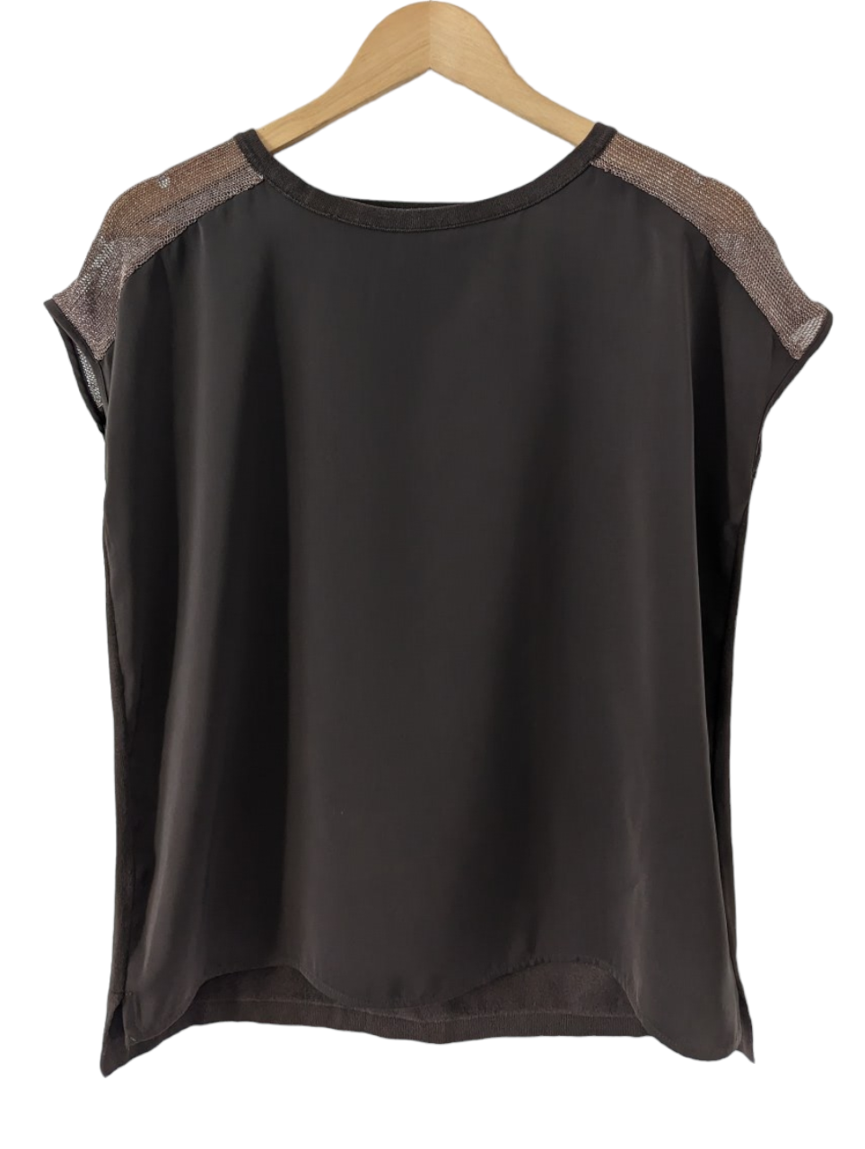 Our Petite Next Top is constructed with a luxuriously silky front and knitted back. This form-fitting piece adds a tailored touch to your wardrobe. It features a khaki hue with a golden mesh shoulder for a subtle, dimensional look. Its timeless silhouette and size 8 ensures a perfect fit. Preloved