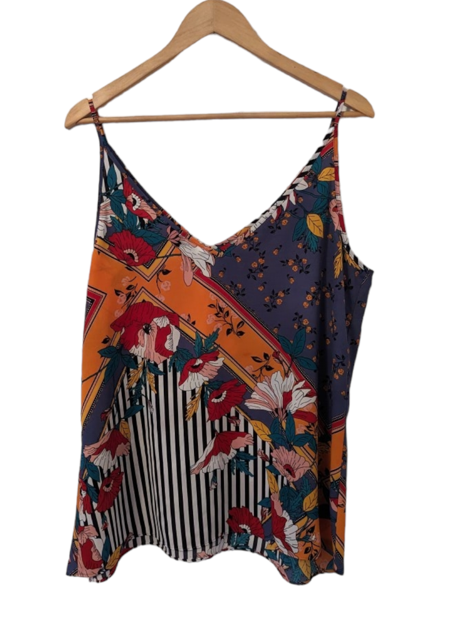 This Stunning Papaya Bright Vest Top is perfect for a statement look. It's size 16 with a bold and eye-catching colour. Style this top with your favourite jeans or skirt to complete the look. Preloved