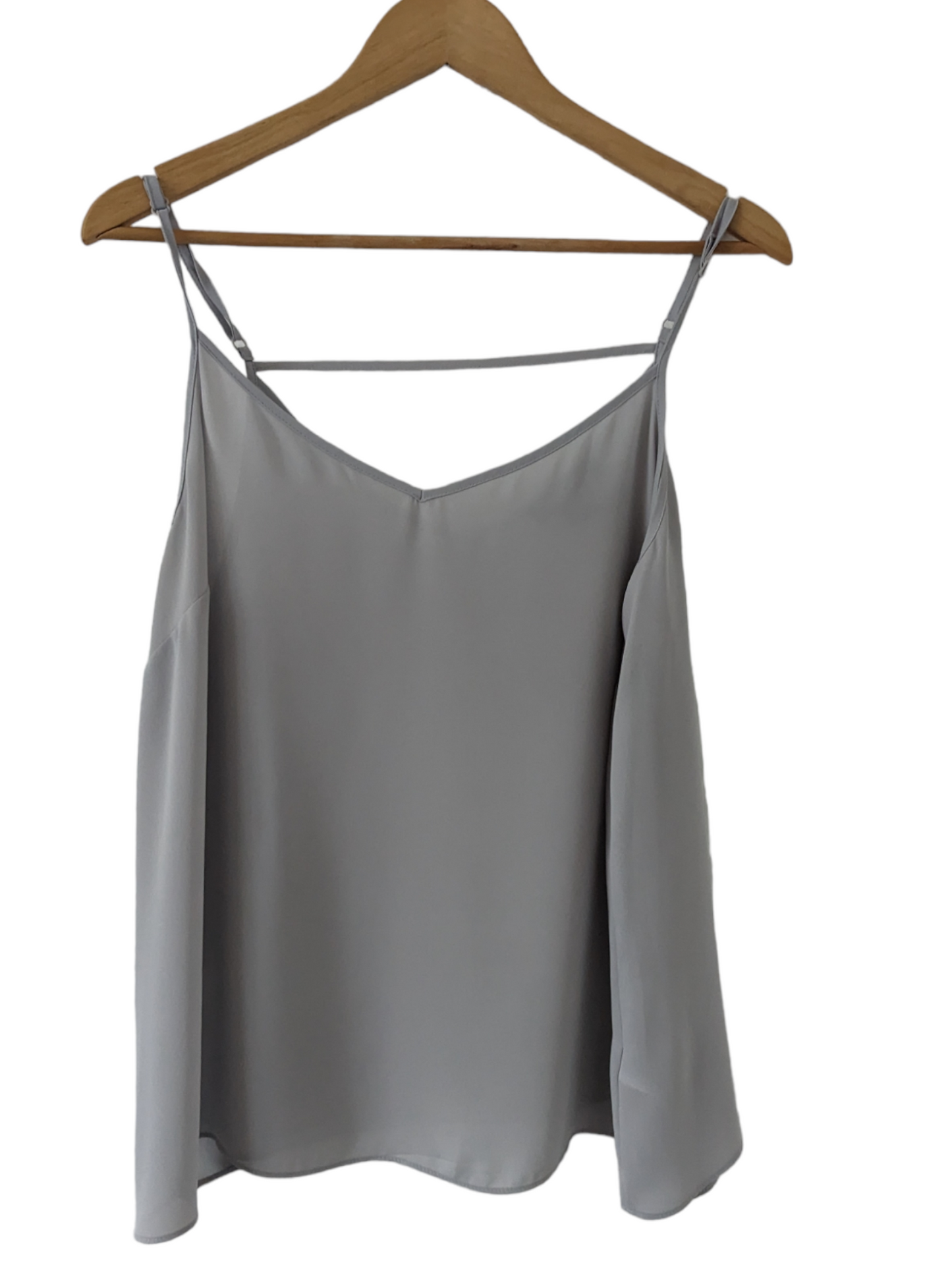 Our Perfect Everyday Grey Cami Top is a must-have addition to your wardrobe. Crafted from soft and comfortable fabric, this top features a classic cami silhouette and comes in a timeless grey hue. With a size 18 fit, it's ideal for completing any outfit. Preloved