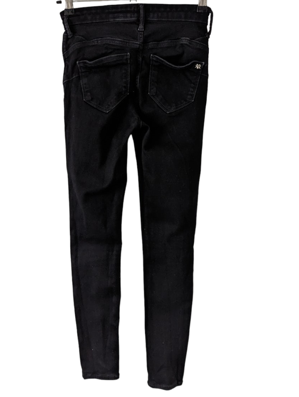 Stay stylish and comfortable with these Black Skinny River Island Jeans. Crafted with super stretch fabric for a flexible fit and maximum comfort, these jeans are ideal for casual or dressy occasions. The size 10 regular offers a flattering silhouette no matter the occasion. Preloved