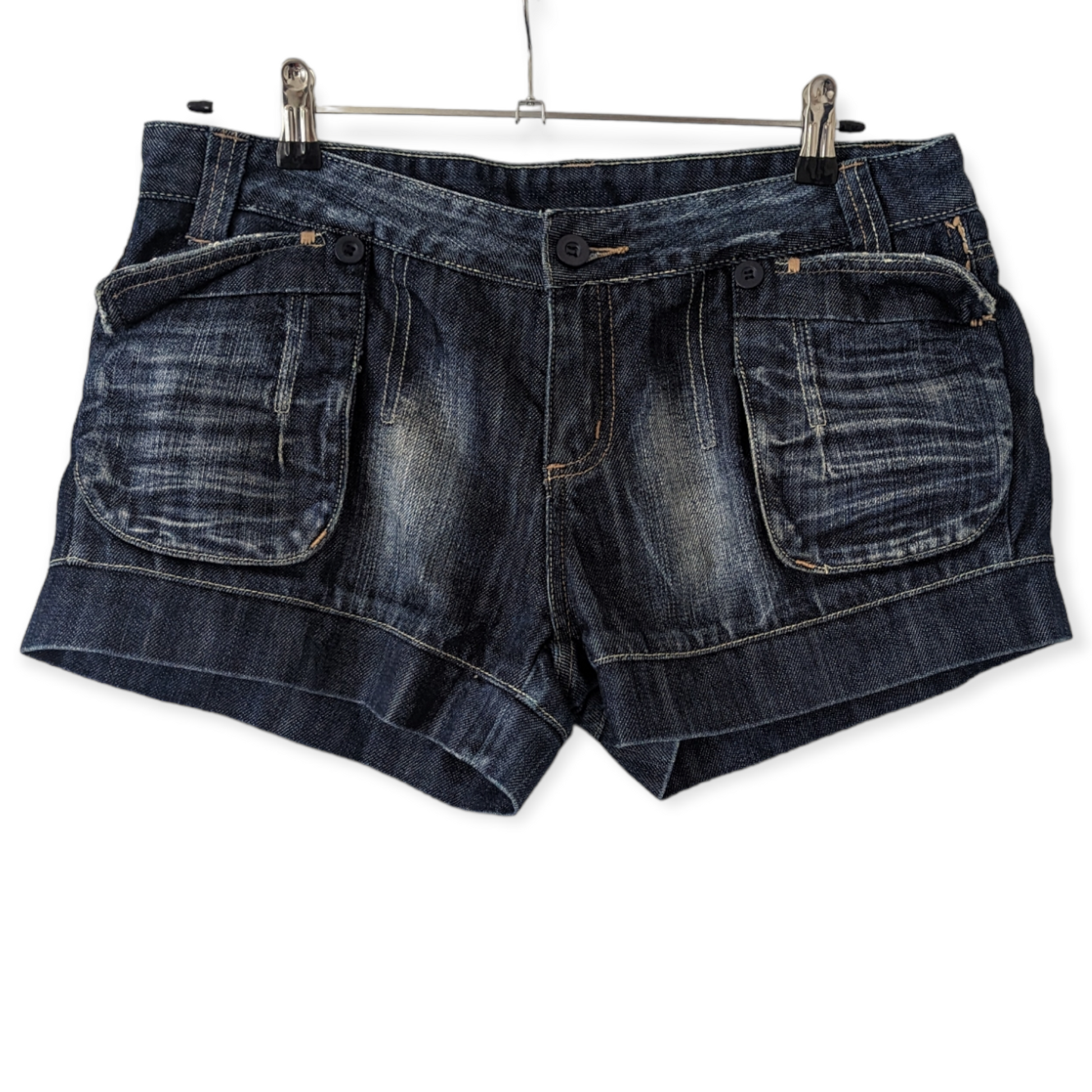 Preloved, Low Rise Denim Shorts from Miss Selfridges offer a timeless look that's perfect for your casual wardrobe. Cut from high-quality denim in a classic size 14 to provide a flattering and comfortable fit. Ideal for any occasion or outfit.