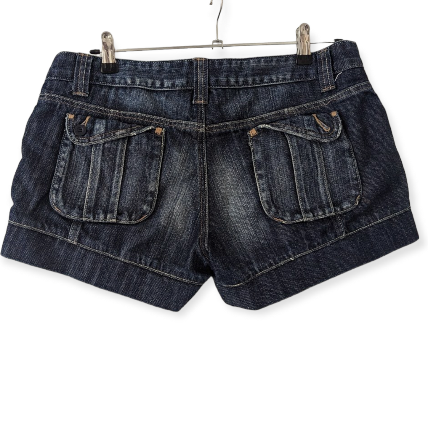 Low Rise Denim Shorts from Miss Selfridges offer a timeless look that's perfect for your casual wardrobe. Cut from high-quality denim in a classic size 14 to provide a flattering and comfortable fit. Ideal for any occasion or outfit. Preloved