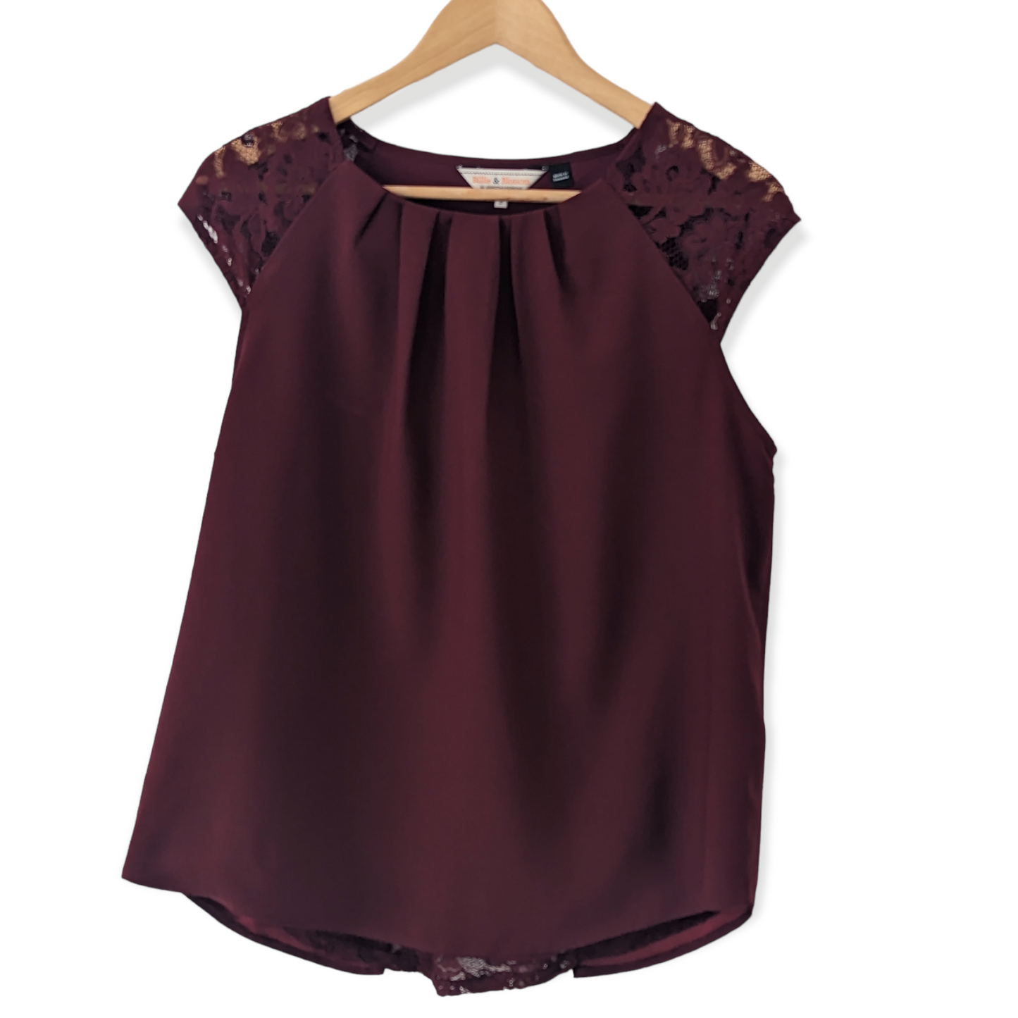 Billie & Blossom top is crafted from luxurious lace and comes in a striking burgundy shade. The size 16 is perfect for creating a sophisticated look that will have you feeling your best. Preloved