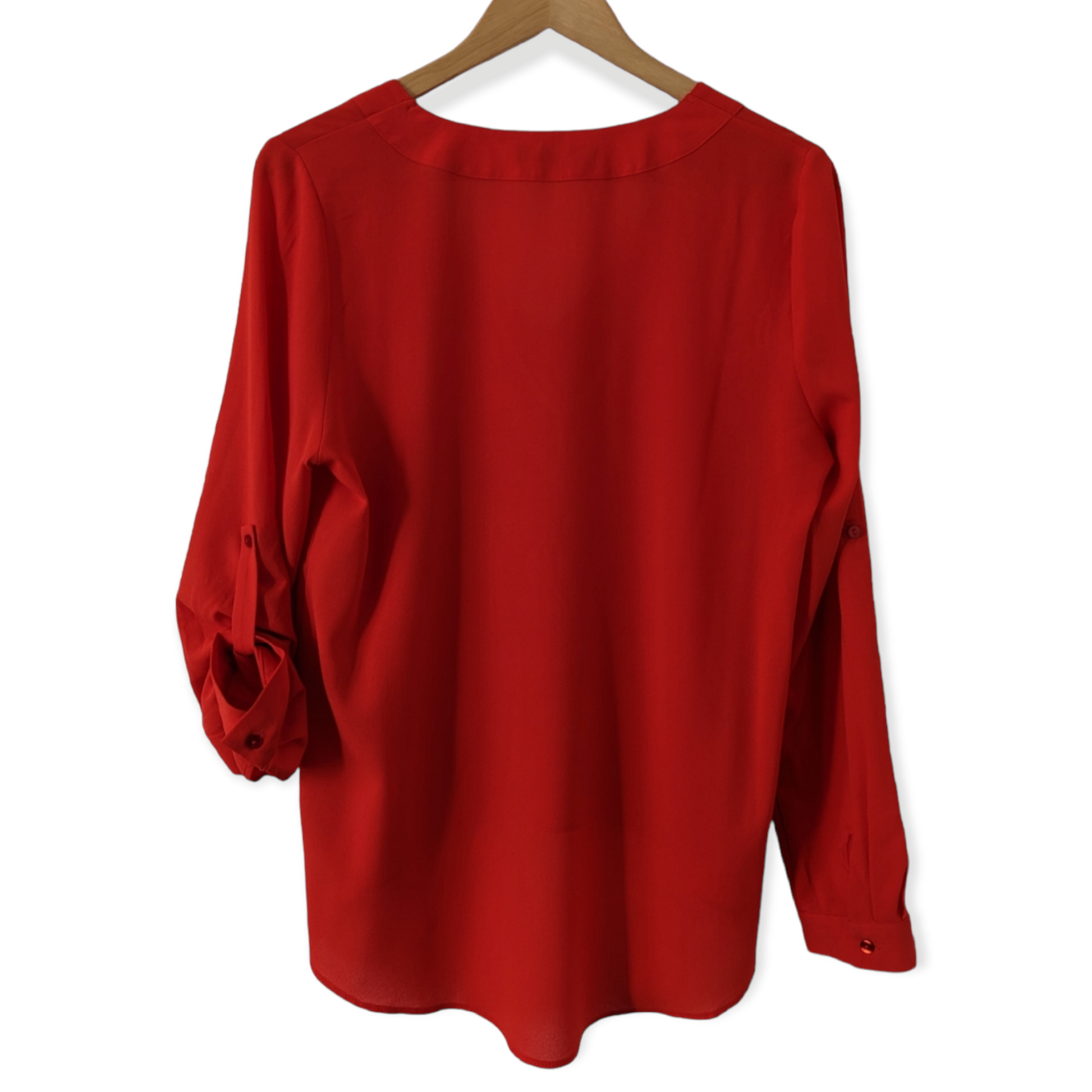 Preloved. Red This red V-neck blouse features stylish buttoned sleeves and is available in size 12. Its atmosphere is sure to capture the eye.